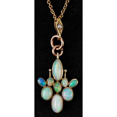 2186 - Unmarked gold cabochon opal cluster pendant on a 9ct gold necklace, 4.5cm high and 40cm in length, t... 