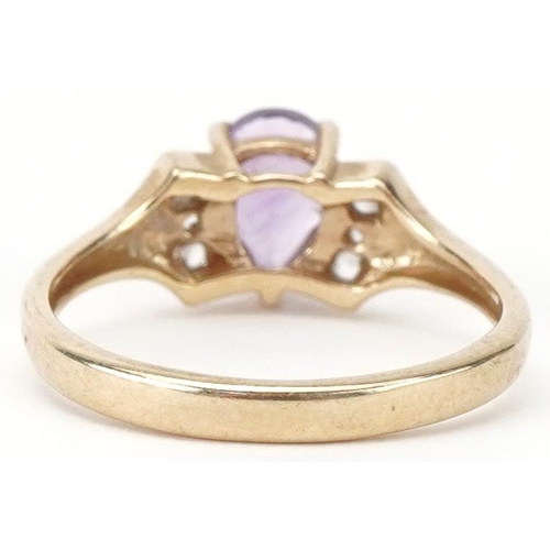 2488 - 9ct gold teardrop amethyst and clear stone ring, size N, 2.4g