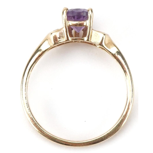 2488 - 9ct gold teardrop amethyst and clear stone ring, size N, 2.4g