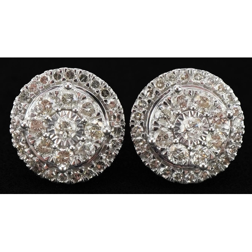 2307 - Pair of 9ct white gold diamond cluster stud earrings, total diamond weight approximately 1.0 carat, ... 