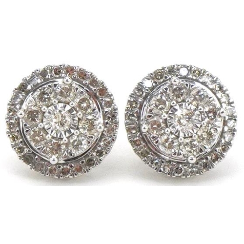 2307 - Pair of 9ct white gold diamond cluster stud earrings, total diamond weight approximately 1.0 carat, ... 