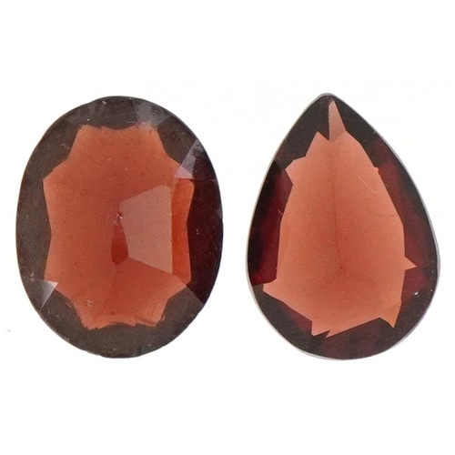 2460 - Two loose garnet gemstones, total weight approximately 4.41 carat