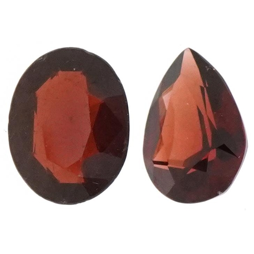 2460 - Two loose garnet gemstones, total weight approximately 4.41 carat