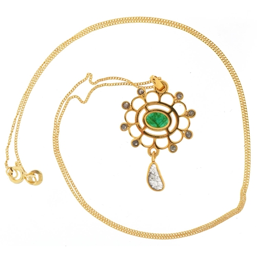 2411 - Yellow metal emerald and diamond openwork pendant on a silver gilt necklace, total diamond weight ap... 