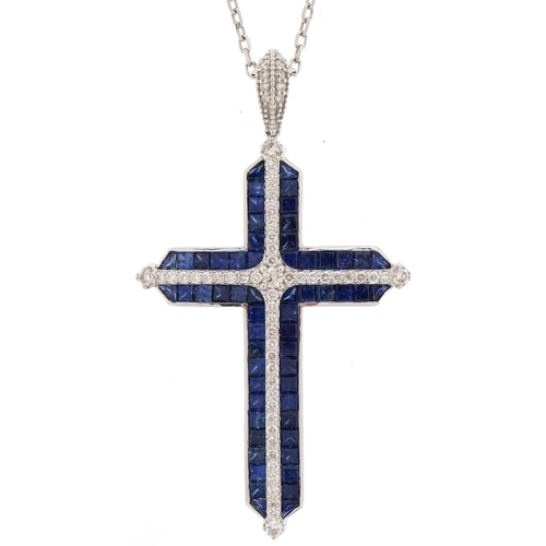 2316 - 18ct white gold sapphire and diamond cross pendant on an 18ct white gold necklace, total diamond wei... 