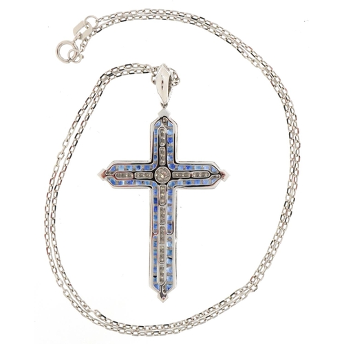 2316 - 18ct white gold sapphire and diamond cross pendant on an 18ct white gold necklace, total diamond wei... 