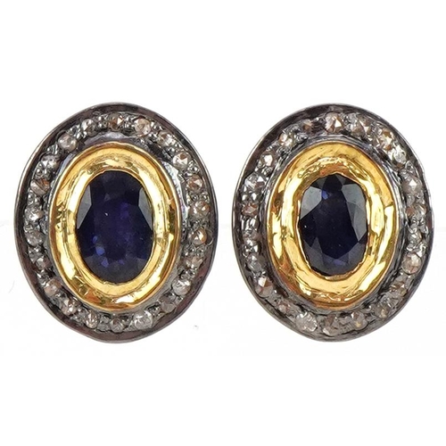 2222 - Pair of silver gilt sapphire and diamond cluster stud earrings, total diamond weight approximately 0... 