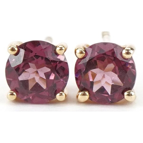 2444 - Pair of 9ct gold pink tourmaline solitaire stud earrings, each 5.8mm in diameter, total 1.6g