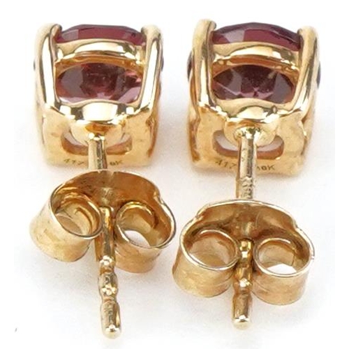 2444 - Pair of 9ct gold pink tourmaline solitaire stud earrings, each 5.8mm in diameter, total 1.6g