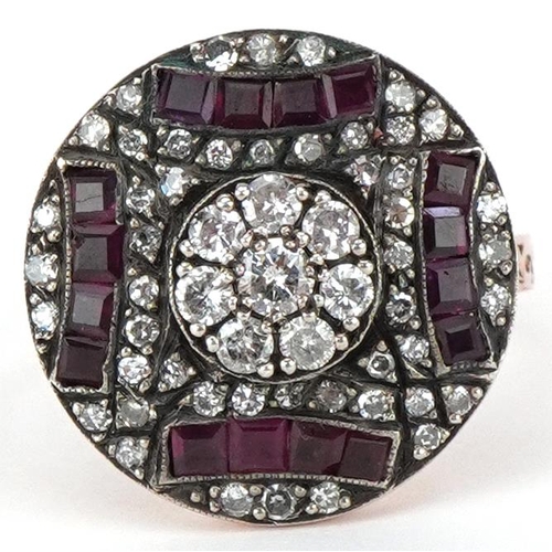 2054 - Art Deco style unmarked rose gold and silver diamond and ruby cocktail ring, total diamond weight ap... 