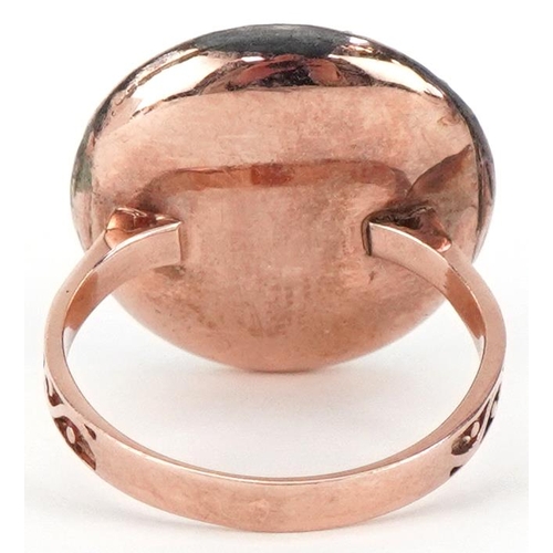 2054 - Art Deco style unmarked rose gold and silver diamond and ruby cocktail ring, total diamond weight ap... 