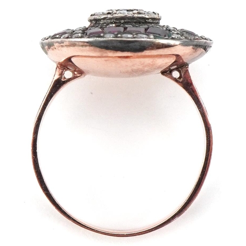 2054 - Art Deco style unmarked rose gold and silver diamond and ruby cocktail ring, total diamond weight ap... 