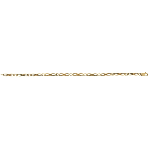 2383 - 9ct gold clear stone infinity link bracelet, 18cm in length, 4.9g