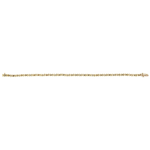 2163 - 9ct two tone gold diamond line bracelet, 18cm in length, 3.5g