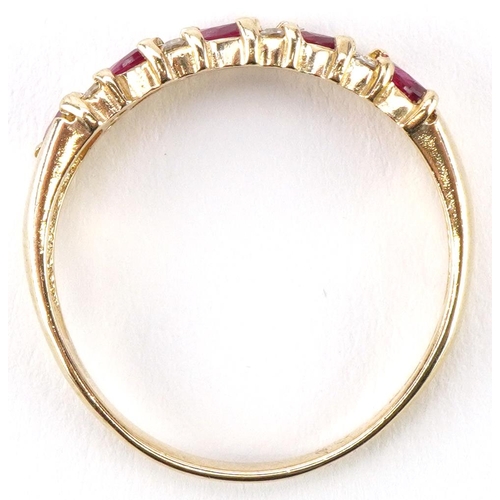 2270 - 9ct gold ruby and diamond thirteen stone half eternity ring, size P, 1.9g