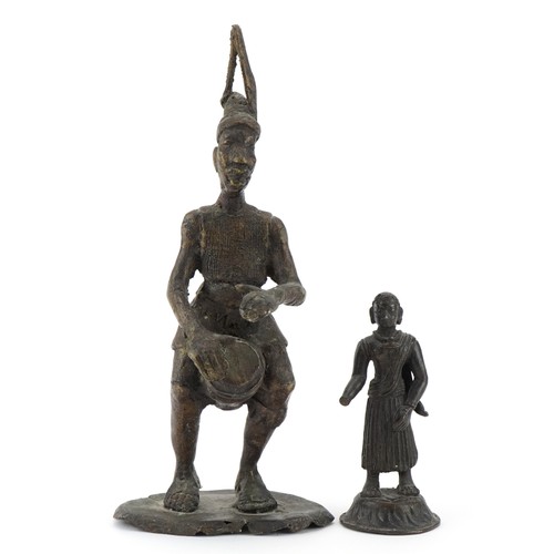 526 - Bronze figure of an Indian god together with a bronze African statue of a drumming man, the largest ... 