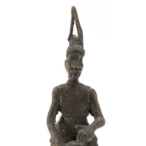 526 - Bronze figure of an Indian god together with a bronze African statue of a drumming man, the largest ... 