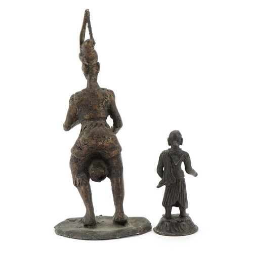 526 - Bronze figure of an Indian god together with a bronze African statue of a drumming man, the largest ... 