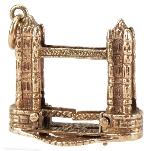 2059 - Large 9ct gold charm in the form of London Tower Bridge with rise and fall bridge, 2.2cm high, 7.4g