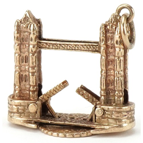 2059 - Large 9ct gold charm in the form of London Tower Bridge with rise and fall bridge, 2.2cm high, 7.4g