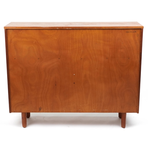 1106A - Avalon, mid century teak side cabinet fitted with a fall and two drawers above a pair of glass slidi... 