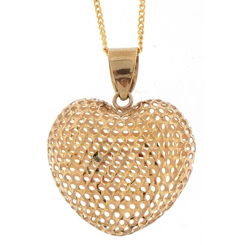 2696 - 9ct gold love heart locket on a 9ct gold necklace housed in a Swag jeweller's box, 2.5cm high and 44... 