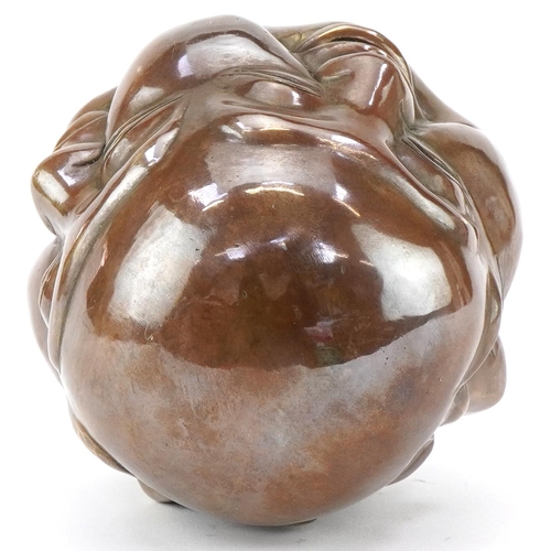 1347 - Chinese patinated bronze four face paperweight, 12cm high