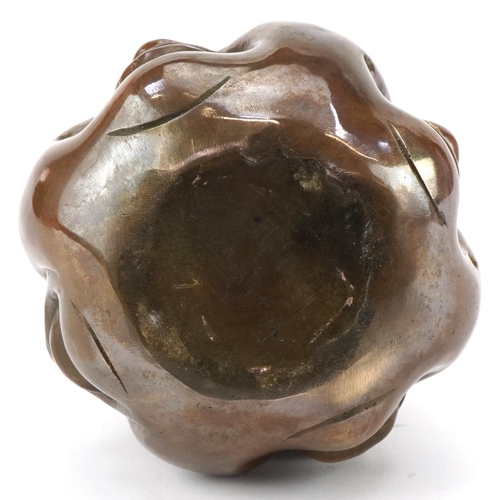 1347 - Chinese patinated bronze four face paperweight, 12cm high