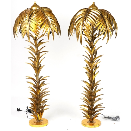 1017 - Pair of Hollywood Regency style gilt painted metal standard lamps in the form of palm trees, each 15... 