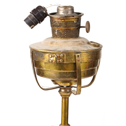 1114 - Victorian adjustable brass standard oil lamp, 135cm high