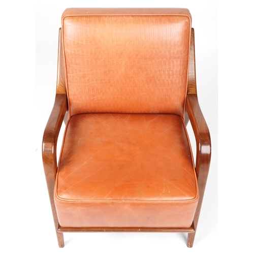 1036 - Scandinavian design hardwood lounge chair having tan upholstered back and seat, 86cm H x 62.5cm W x ... 