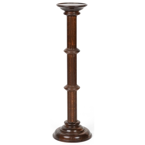 1090 - Carved oak torchere, 98cm high