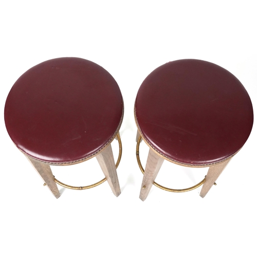 1091 - Pair of contemporary breakfast bar stools with burgundy leather upholstered padded seats, each 72cm ... 