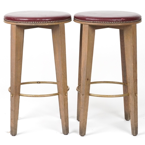 1091 - Pair of contemporary breakfast bar stools with burgundy leather upholstered padded seats, each 72cm ... 