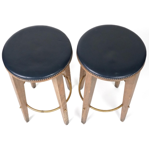 1092 - Pair of contemporary breakfast bar stools with blue leather upholstered padded seats, each 72cm high