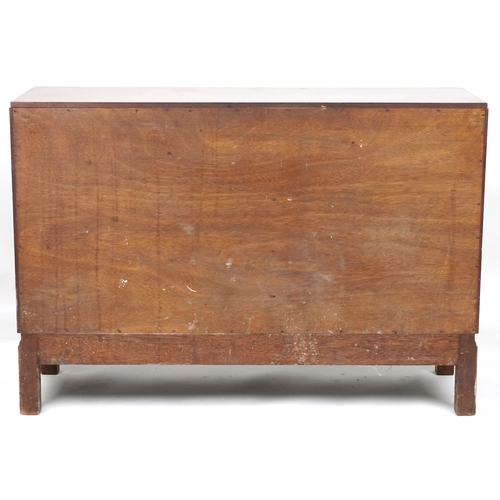 1005 - Maple and Co, Art Deco walnut sideboard with two drawers above a pair of cupboard doors enclosing sh... 