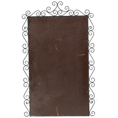 1137 - Wrought iron framed wall hanging mirror, 79cm x 49cm