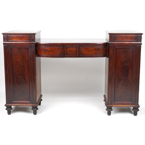 1024 - 19th century mahogany twin pedestal sideboard with three drawers above a pair of cupboard doors and ... 