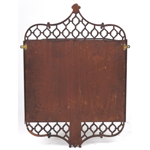 1019 - Mahogany wall hanging open fretwork wall hanging shelves with bevelled glass mirrored back, 84cm H x... 