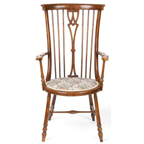 1066 - Arts & Crafts beech and elm stick back open armchair with tapestry upholstered seat, raised on turne... 