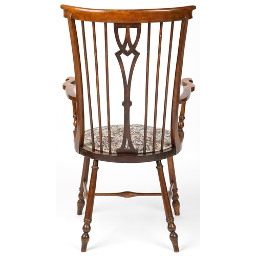 1066 - Arts & Crafts beech and elm stick back open armchair with tapestry upholstered seat, raised on turne... 