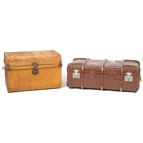 1121 - Two vintage travelling trunks including one tin example, the largest 95 cm in length