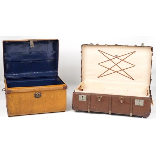 1121 - Two vintage travelling trunks including one tin example, the largest 95 cm in length