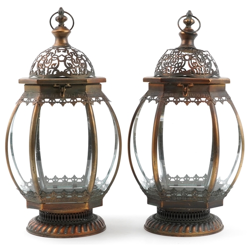 1454 - Pair of partially gilt bronzed hanging lanterns, each 50cm high