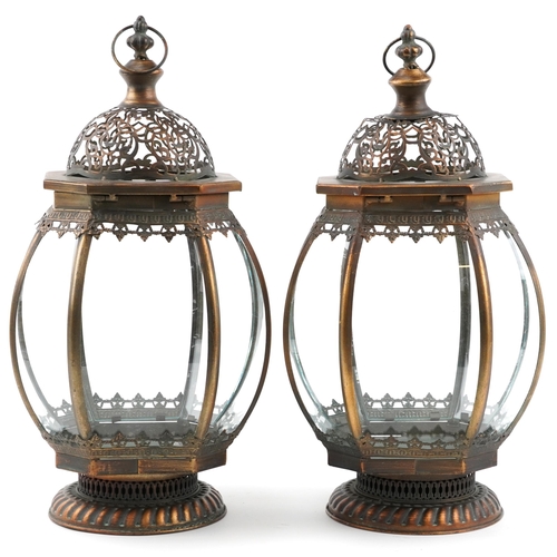 1454 - Pair of partially gilt bronzed hanging lanterns, each 50cm high