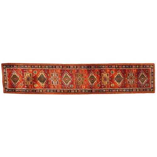 1125A - Rectangular Turkish carpet runner having and all over floral design 385cm x 69cm