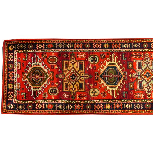 1125A - Rectangular Turkish carpet runner having and all over floral design 385cm x 69cm