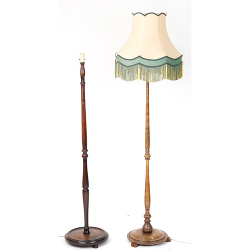 1112 - Two early 20th century turned standard lamps, one with silk lined shade, each 160cm high