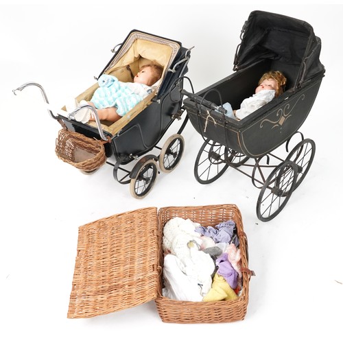 1500 - Two Victorian child's dolls prams and two composite dolls, the largest 84cm high