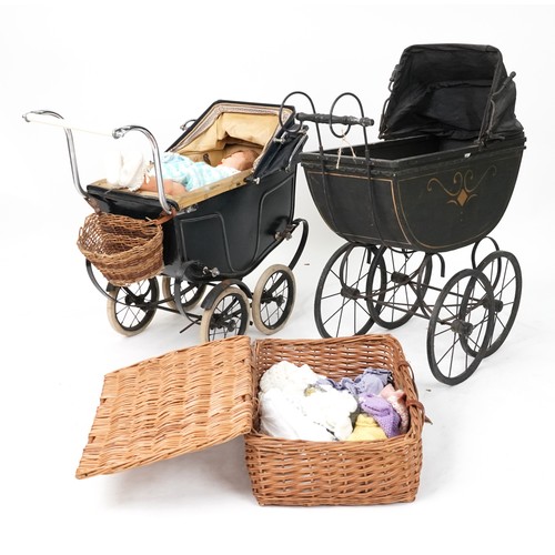 1500 - Two Victorian child's dolls prams and two composite dolls, the largest 84cm high